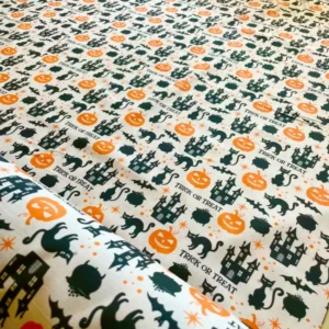 Tessuto Halloween bianco, nero e arancio